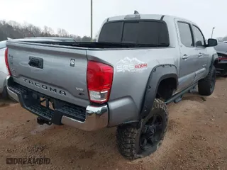 2017 Toyota Tacoma SR5 with VIN 5TFCZ5AN7HX080023, listed as a IAAI auction lot 41694844 with 79,295 mi miles. Bid and sale history available at carsss.com. Image 4.