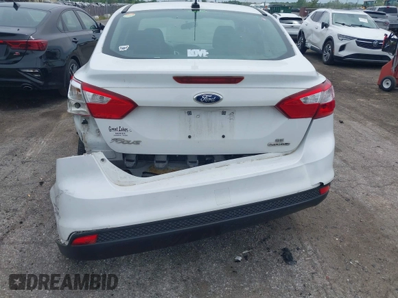 2013 Ford Focus SE with VIN 1FADP3F24DL380185, listed as a IAAI auction lot 42312998 with Not provided miles and . Bid and sale history available at DreamBid. Image 6.