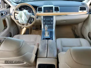 2012 Lincoln MKS with VIN 1LNHL9ERXCG801273, listed as a Copart auction lot 82476574 with 203,370 mi miles and Salvage Title. Bid and sale history available at DreamBid. Image 8.