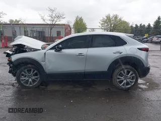 2021 Mazda CX-30 Preferred with VIN 3MVDMBCL6MM240663, listed as a IAAI auction lot 42165803 with 52,262 mi miles and . Bid and sale history available at DreamBid. Image 13.