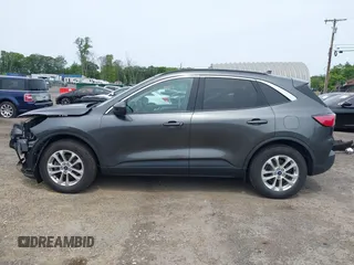 2020 Ford Escape SE z VIN 1FMCU9G68LUB54383, wystawiony jako IAAI lot #42356897 z przebiegiem 69 587 mil mil oraz . Historia ofert i sprzedaży dostępna na DreamBid. Obrazek 15.