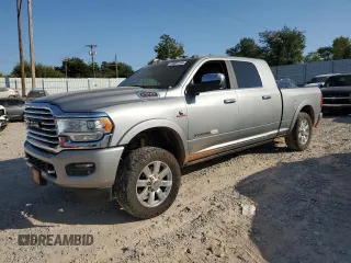 2021 Ram 2500 Longhorn with VIN 3C6UR5PLXMG576496, listed as a Copart auction lot 76097194 with 115,712 mi miles and Salvage title. Bid and sale history available at DreamBid. Image 1.