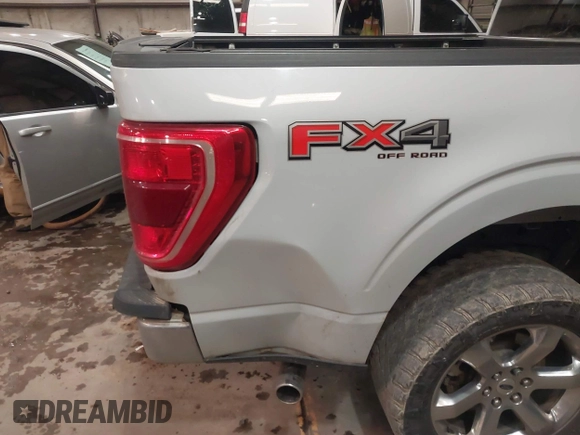 2022 Ford F-150 XL with VIN 1FTFW1E59NKD48281, listed as a IAAI auction lot 41564135 with 68,496 mi miles and . Bid and sale history available at DreamBid. Image 17.