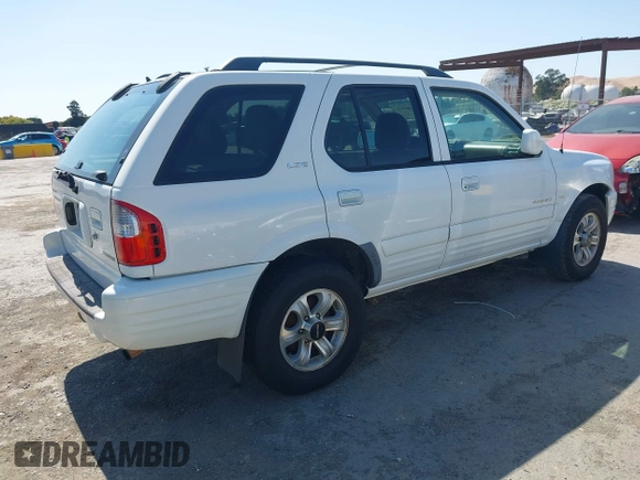 2001 Isuzu Rodeo S with VIN 4S2CK58W614332181, listed as a IAAI auction lot 42585130 with 196,497 mi miles and . Bid and sale history available at DreamBid. Image 4.