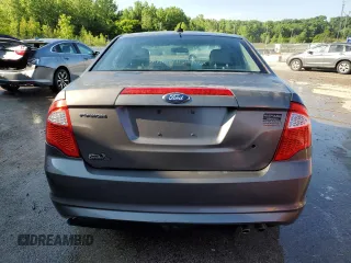 2012 Ford Fusion SE z VIN 3FAHP0HA0CR437115, wystawiony jako Copart lot #56583495 z przebiegiem 159 649 mil mil oraz Szkoda całkowita • Salvage title. Historia ofert i sprzedaży dostępna na DreamBid. Obrazek 6.