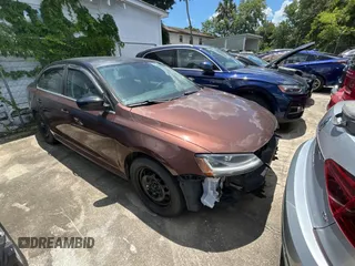 2017 Volkswagen Jetta S with VIN 3VW167AJXHM318006, listed as a Copart auction lot 61691635 with 101,452 mi miles and Salvage title. Bid and sale history available at DreamBid. Image 1.
