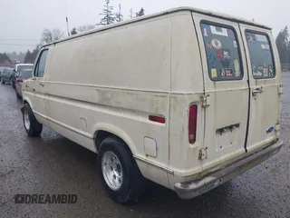 1990 Ford Econoline Cargo with VIN 1FTDE14N0LHA80405, listed as a IAAI auction lot 41824747 with 91,278 mi miles and . Bid and sale history available at DreamBid. Image 3.