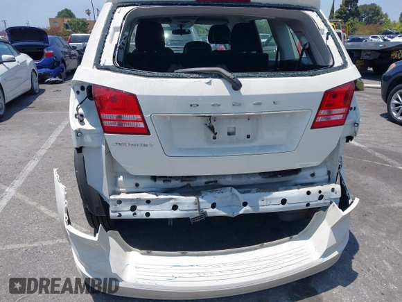 2013 Dodge Journey American Value with VIN 3C4PDCAB4DT503821, listed as a IAAI auction lot 42462848 with 109,902 mi miles and . Bid and sale history available at DreamBid. Image 6.