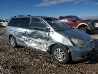 2007 Honda Odyssey EX-L with VIN 5FNRL38647B023186, listed as a Copart auction lot 87697035 with 190,884 mi miles and Salvage Title. Bid and sale history available at carsss.com. Image 4.