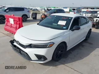 2023 Honda Civic Sport with VIN 2HGFE2F54PH521840, listed as a IAAI auction lot 42258323 with Not provided miles and . Bid and sale history available at DreamBid. Image 2.