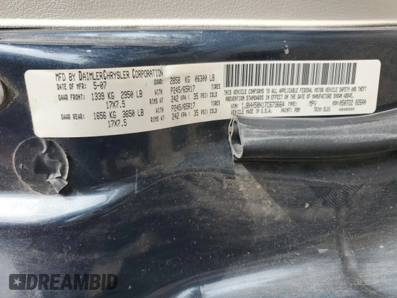 2007 Jeep Commander Limited z VIN 1J8HH58N17C673664, wystawiony jako Copart lot #65282184 z przebiegiem 177 695 mil mil oraz Szkoda całkowita • Salvage title. Historia ofert i sprzedaży dostępna na DreamBid. Obrazek 13.