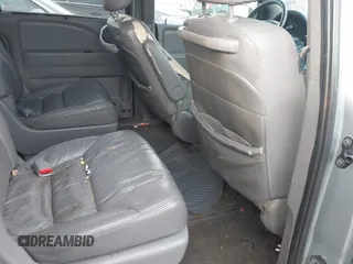 2010 Honda Odyssey EX-L with VIN 5FNRL3H70AB027137, listed as a IAAI auction lot 41659981 with 202,256 mi miles and . Bid and sale history available at DreamBid. Image 8.