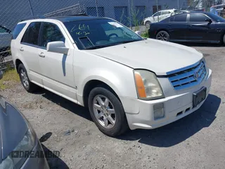 2006 Cadillac SRX z VIN 1GYEE637360209979, wystawiony jako IAAI lot #42103190 z przebiegiem Nie podano mil oraz . Historia ofert i sprzedaży dostępna na DreamBid. Obrazek 1.