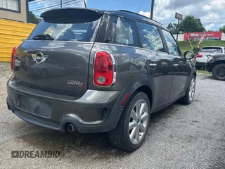 2012 MINI Countryman S с VIN WMWZC5C58CWL60215, выставлен на аукционе Copart как лот 63710935 с пробегом 127 673 миль миль и Чистый • Clean title. История ставок и продаж доступна на DreamBid. Изображение 4.