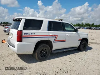 2015 Chevrolet Tahoe Commercial with VIN 1GNLC2EC4FR590119, listed as a Copart auction lot 62159795 with 93,021 mi miles and Salvage title. Bid and sale history available at DreamBid. Image 3.