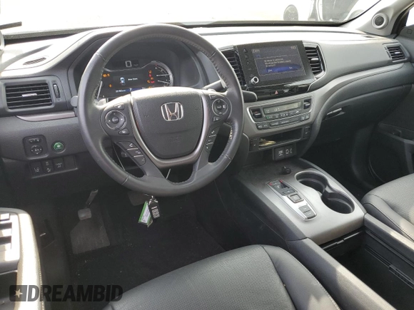 2023 Honda Ridgeline RTL with VIN 5FPYK3F53PB067003, listed as a Copart auction lot 58384895 with 31,983 mi miles and Salvage title. Bid and sale history available at DreamBid. Image 8.