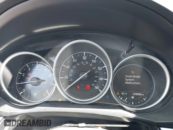 2019 Mazda CX-5 Sport with VIN JM3KFABM7K1509987, listed as a IAAI auction lot 42062804 with 50,898 mi miles and . Bid and sale history available at DreamBid. Image 7.