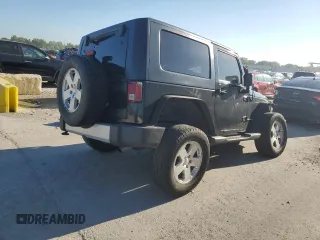 2010 Jeep Wrangler Sahara z VIN 1J4AA5D1XAL227305, wystawiony jako Copart lot #70165554 z przebiegiem Nie podano mil oraz Szkoda całkowita • Salvage title. Historia ofert i sprzedaży dostępna na DreamBid. Obrazek 3.