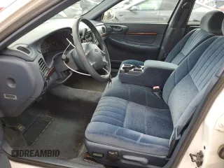 2002 Chevrolet Impala z VIN 2G1WF55EX29285642, wystawiony jako Copart lot #58198125 z przebiegiem 215 388 mil mil oraz Szkoda całkowita • Salvage title. Historia ofert i sprzedaży dostępna na DreamBid. Obrazek 7.