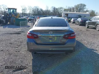 2018 Nissan Altima 2.5 SR with VIN 1N4AL3AP7JC240029, listed as a IAAI auction lot 41883209 with 77,190 mi miles. Bid and sale history available at carsss.com. Image 16.