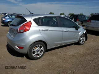 2015 Ford Fiesta SE z VIN 3FADP4EJ0FM212740, wystawiony jako Copart lot #63944573 z przebiegiem 123 037 mil mil oraz Szkoda całkowita • Salvage title. Historia ofert i sprzedaży dostępna na DreamBid. Obrazek 3.