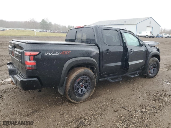 2025 Nissan Frontier PRO-4X with VIN 1N6ED1EK1SN606744, listed as a Copart auction lot 50168825 with 7,434 mi miles and Salvage Title. Bid and sale history available at carsss.com. Image 3.