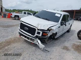 2018 Ford F-150 XL z VIN 1FTFW1E57JKF55049, wystawiony jako IAAI lot #42099491 z przebiegiem 159 170 mil mil oraz . Historia ofert i sprzedaży dostępna na DreamBid. Obrazek 19.
