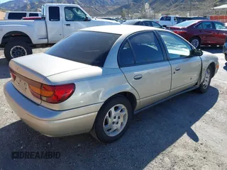 2002 Saturn SL z VIN 1G8ZK52722Z103373, wystawiony jako IAAI lot #41681684 z przebiegiem 109 389 mil mil oraz . Historia ofert i sprzedaży dostępna na DreamBid. Obrazek 4.