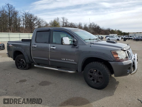 2007 Nissan Titan LE with VIN 1N6AA07B77N219993, listed as a Copart auction lot 44948415 with 170,422 mi miles and Salvage title. Bid and sale history available at DreamBid. Image 4.