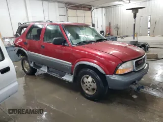 1999 GMC Jimmy SLE with VIN 1GKDT13W3X2535602, listed as a Copart auction lot 83250924 with 203,134 mi miles and Salvage Title. Bid and sale history available at carsss.com. Image 4.