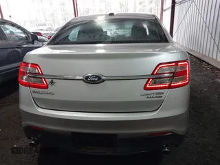 2014 Ford Taurus Limited with VIN 1FAHP2F81EG101351, listed as a IAAI auction lot 41662308 with 139,542 mi miles. Bid and sale history available at carsss.com. Image 16.