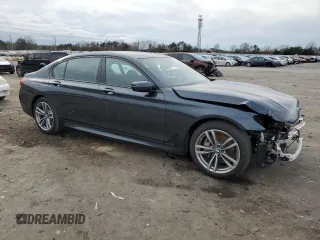 2019 BMW 7 Series 740i xDrive with VIN WBA7E4C51KGV70031, listed as a Copart auction lot 38008974 with 33,555 mi miles and . Bid and sale history available at DreamBid. Image 4.