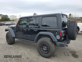 2023 Jeep Wrangler Sport with VIN 1C4HJXDG8PW643414, listed as a Copart auction lot 87768255 with 31,894 mi miles and Salvage Title. Bid and sale history available at DreamBid. Image 2.