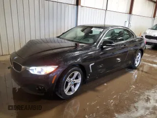 2015 BMW 4 Series 428i xDrive with VIN WBA3T1C52FP821244, listed as a Copart auction lot 42803085 with 71,372 mi miles and Salvage Title. Bid and sale history available at carsss.com. Image 1.