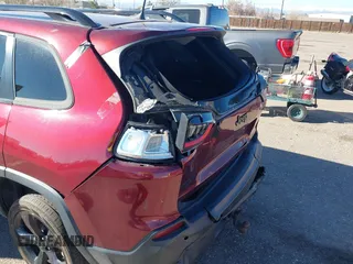 2019 Jeep Cherokee Latitude Plus with VIN 1C4PJMLX5KD456292, listed as a IAAI auction lot 40940110 with 95,622 mi miles and . Bid and sale history available at DreamBid. Image 6.