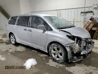 2012 Toyota Sienna with VIN 5TDZK3DC7CS231079, listed as a Copart auction lot 41809535 with 157,154 mi miles and Salvage Title. Bid and sale history available at carsss.com. Image 4.