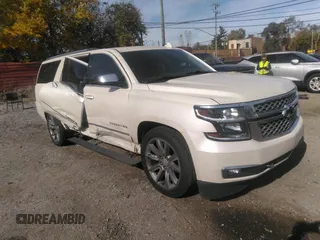 2015 Chevrolet Suburban LTZ with VIN 1GNSKKKC0FR551031, listed as a IAAI auction lot 40694559 with 184,261 mi miles. Bid and sale history available at carsss.com. Image 1.