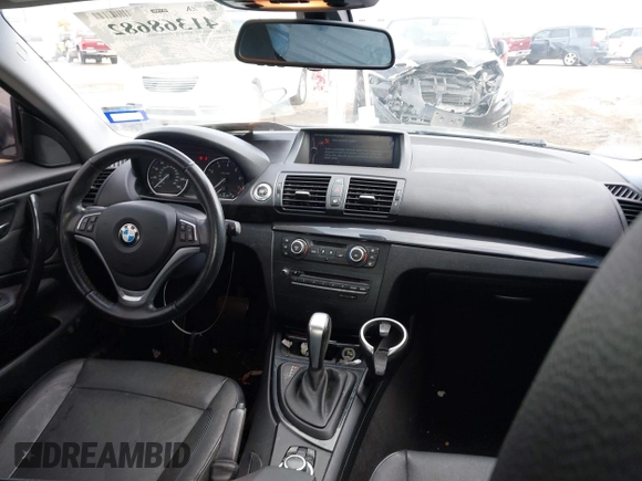 2013 BMW 1 Series 128i with VIN WBAUP7C52DVP24985, listed as a IAAI auction lot 41368682 with 107,294 mi miles and . Bid and sale history available at carsss.com. Image 5.