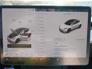 2023 Tesla Model Y Performance with VIN 7SAYGDEF2PF754938, listed as a IAAI auction lot 42067041 with 21,103 mi miles and . Bid and sale history available at DreamBid. Image 7.