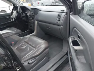 2004 Honda Pilot EX with VIN 2HKYF18674H585328, listed as a IAAI auction lot 41688735 with 214,194 mi miles. Bid and sale history available at carsss.com. Image 5.