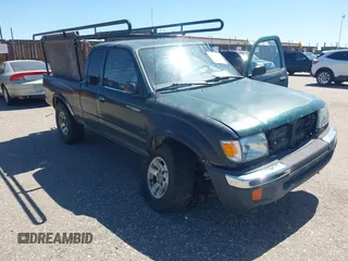 1999 Toyota Tacoma with VIN 4TAWN72N7XZ490080, listed as a IAAI auction lot 42550447 with 295,096 mi miles and . Bid and sale history available at DreamBid. Image 1.