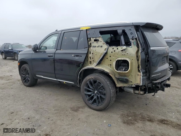 2021 Cadillac Escalade Premium Luxury with VIN 1GYS4BKL9MR215159, listed as a Copart auction lot 48577415 with 50,773 mi miles and Salvage Title. Bid and sale history available at carsss.com. Image 2.