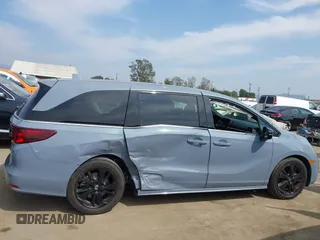2023 Honda Odyssey Sport z VIN 5FNRL6H72PB031975, wystawiony jako IAAI lot #42047457 z przebiegiem 34 886 mil mil oraz . Historia ofert i sprzedaży dostępna na DreamBid. Obrazek 13.