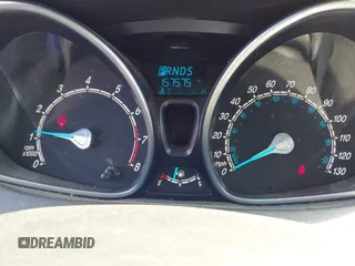 2014 Ford Fiesta SE with VIN 3FADP4BJ5EM190009, listed as a IAAI auction lot 42036976 with 157,575 mi miles. Bid and sale history available at carsss.com. Image 7.