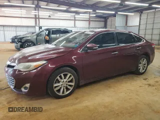 2013 Toyota Avalon XLE with VIN 4T1BK1EB8DU023894, listed as a Copart auction lot 59971355 with 231,795 mi miles and Salvage title. Bid and sale history available at DreamBid. Image 1.