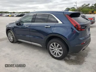 2021 Cadillac XT4 FWD Premium Luxury z VIN 1GYFZCR48MF056210, wystawiony jako Copart lot #45818245 z przebiegiem Nie podano mil oraz Nie do naprawy • Non repairable. Historia ofert i sprzedaży dostępna na DreamBid. Obrazek 2.