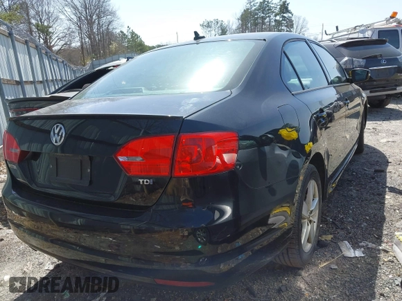2012 Volkswagen Jetta Sedan TDI w/Premium & Nav with VIN 3VWLL7AJ1CM334735, listed as a IAAI auction lot 41749312 with 196,237 mi miles. Bid and sale history available at carsss.com. Image 4.