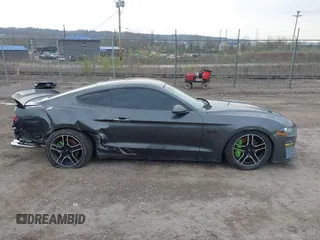 2018 Ford Mustang GT z VIN 1FA6P8CF9J5179766, wystawiony jako IAAI lot #41977000 z przebiegiem 83 608 mil mil oraz . Historia ofert i sprzedaży dostępna na DreamBid. Obrazek 14.