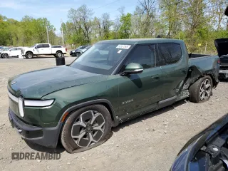 2024 Rivian R1T Adventure z VIN 7FCTGCAA1RN030829, wystawiony jako Copart lot #55557565 z przebiegiem Nie podano mil oraz Szkody całkowita. Historia ofert i sprzedaży dostępna na DreamBid. Obrazek 1.