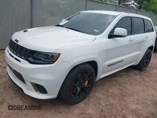 2021 Jeep Grand Cherokee Trackhawk with VIN 1C4RJFN95MC843131, listed as a IAAI auction lot 42688185 with 16,391 mi miles and . Bid and sale history available at DreamBid. Image 17.